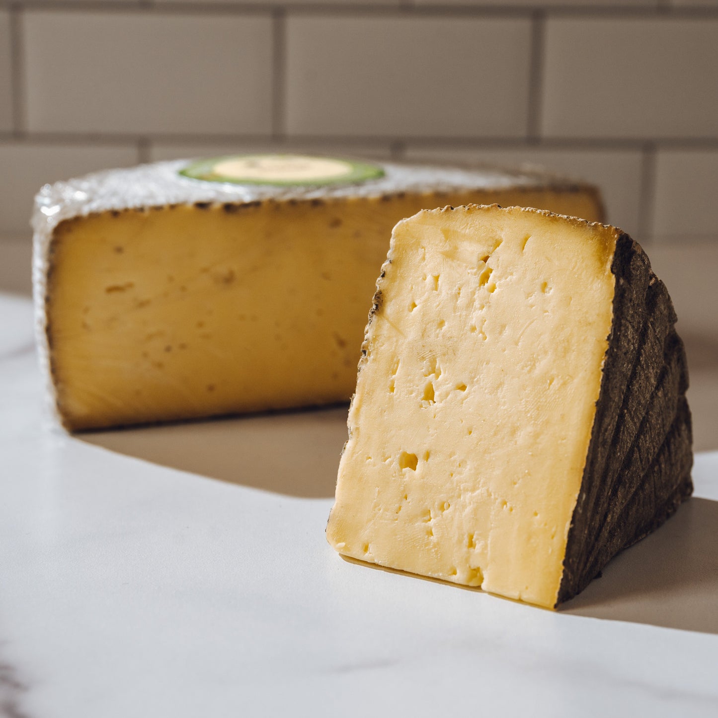 8oz Swallow Tail Tomme Cheese Wedge